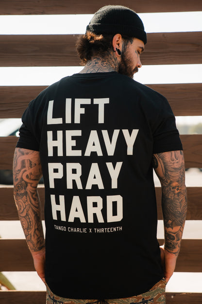 Lift Heavy. Pray Hard. - Black Tee