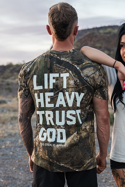 Lift Heavy. Trust God. - Realtree Premium Camo Tee